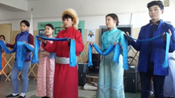 A mini presentation by even more of our students. The blue silk scarfs are honorary.